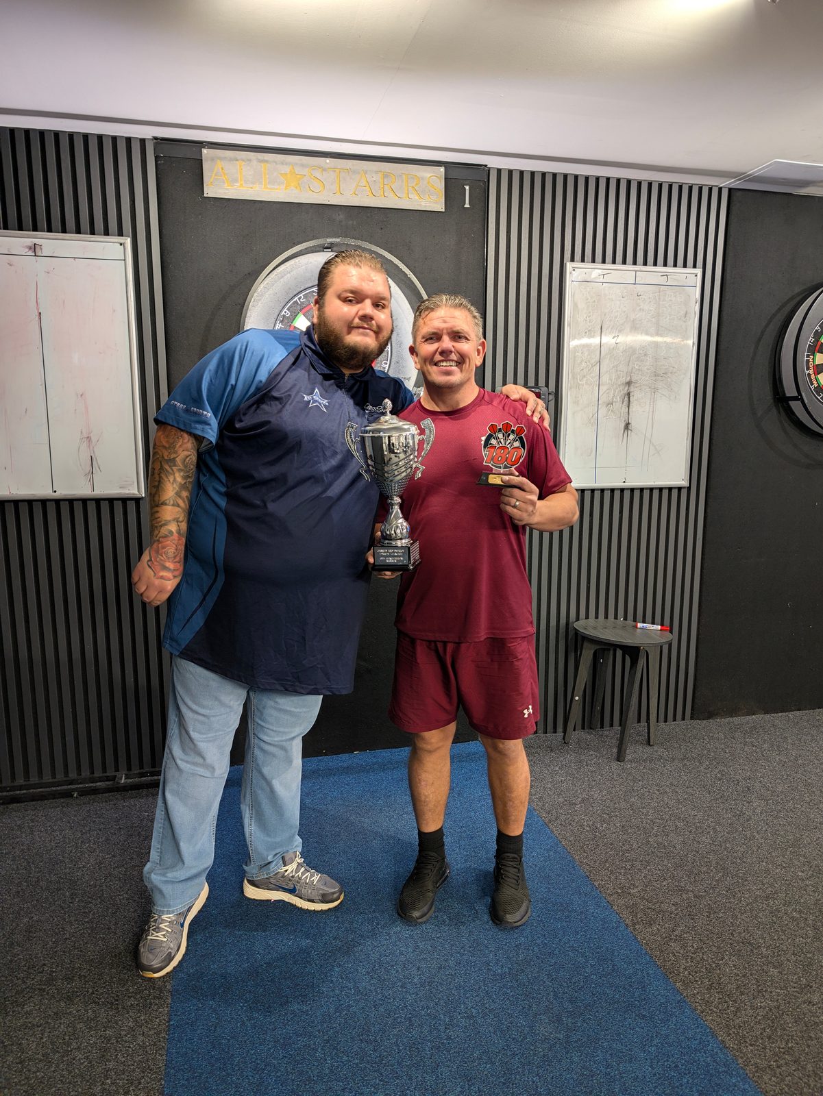 Jimmy Wright, winner of the 2026 180s Competition, with the trophy